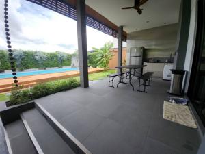 ให้เช่าบ้านเดี่ยวหรู 2ชั้นเนื้อที่ 200ตร.ว พื้นที่ใช้สอย 375ตร.ม 5ห้องนอน 6ห้องน้ำ เฟอร์ครบ ถนนบางนาตราด ห้างเมกะ ราคาเช่า 380,000 บ/ด ภาพที่ 7